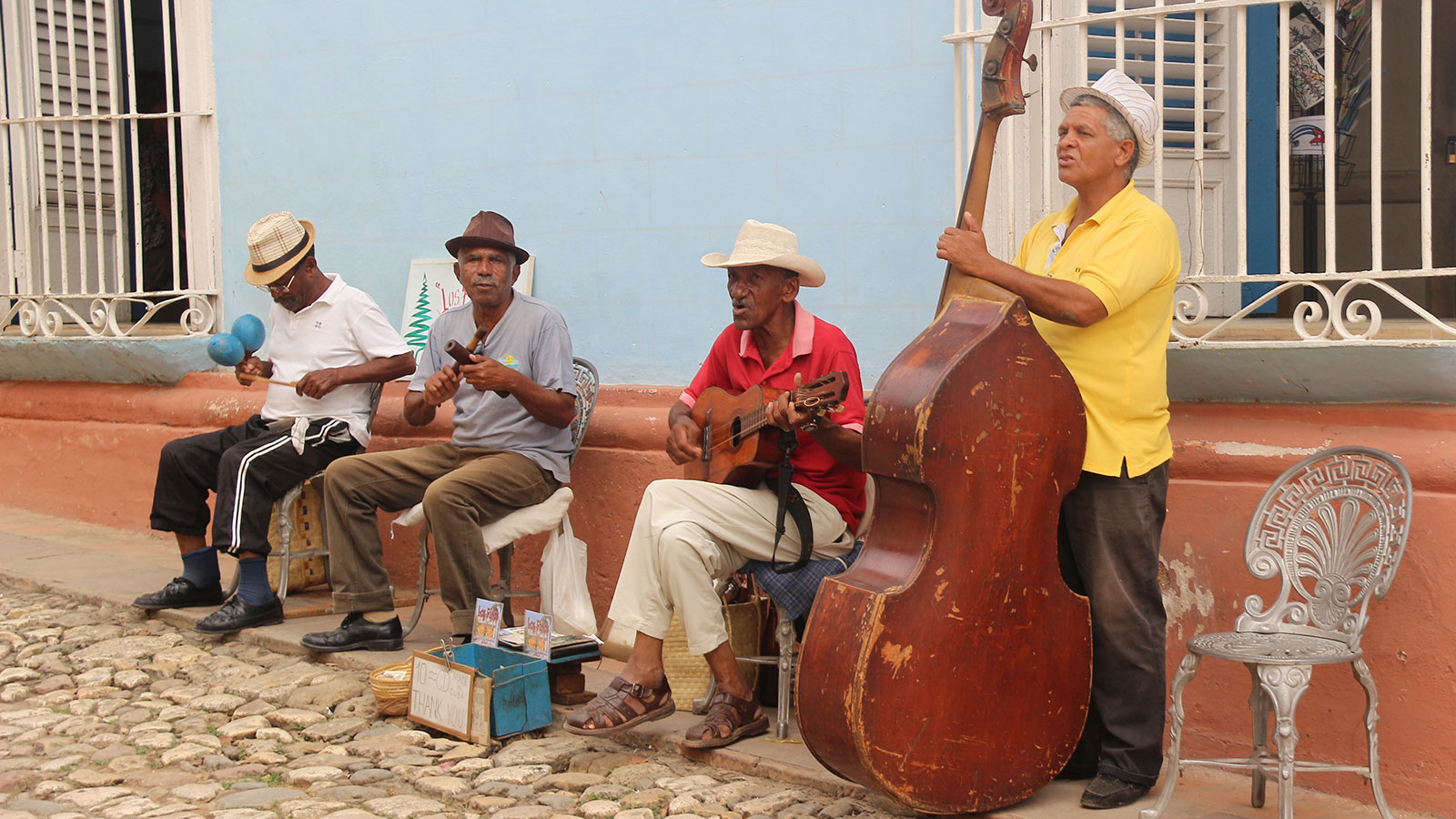 Cuban musicians, 'veteranos', busking on the streets of Trinidad, Cuba